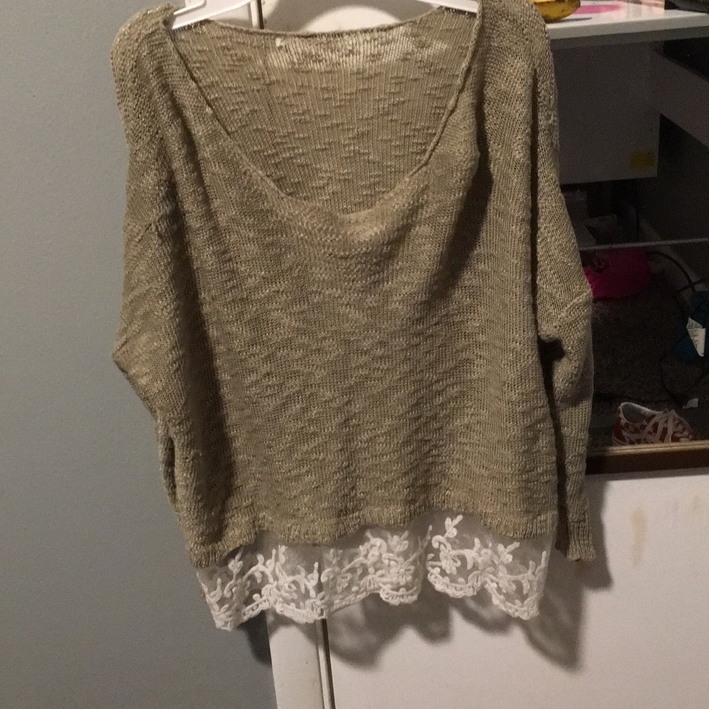 Tan stitching and white lace shirt